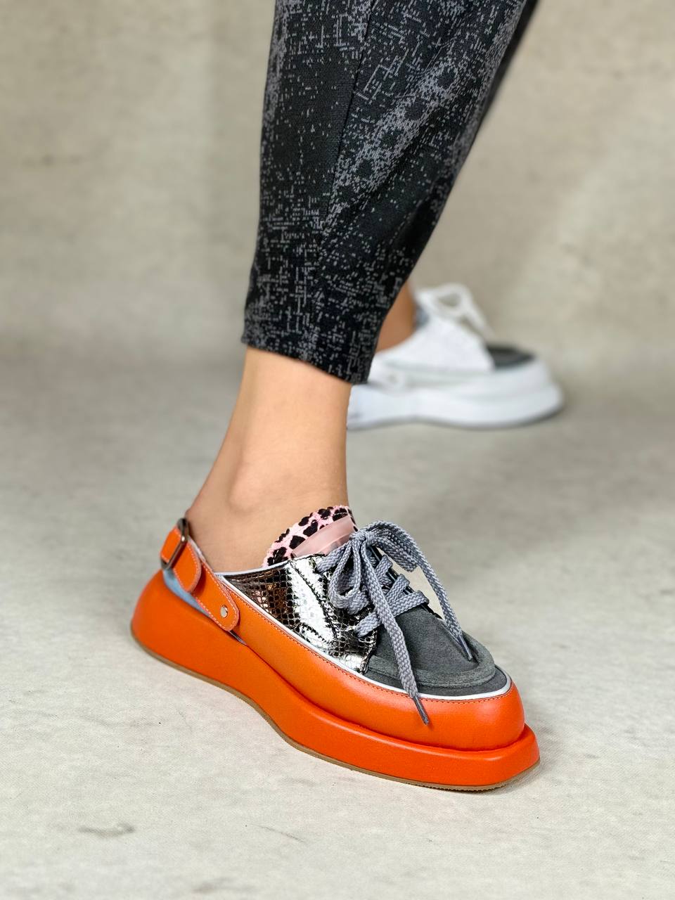 The Aurora Lift – Ember & Chrome sneaker (Cynthia Orange)