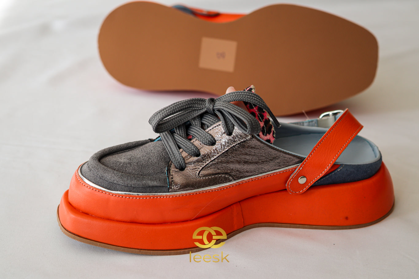 The Aurora Lift – Ember & Chrome sneaker (Cynthia Orange)