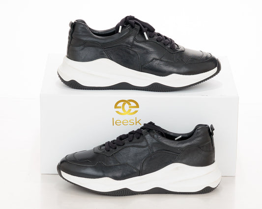 The Urban Motion Sneaker — Black Leather (Khube)